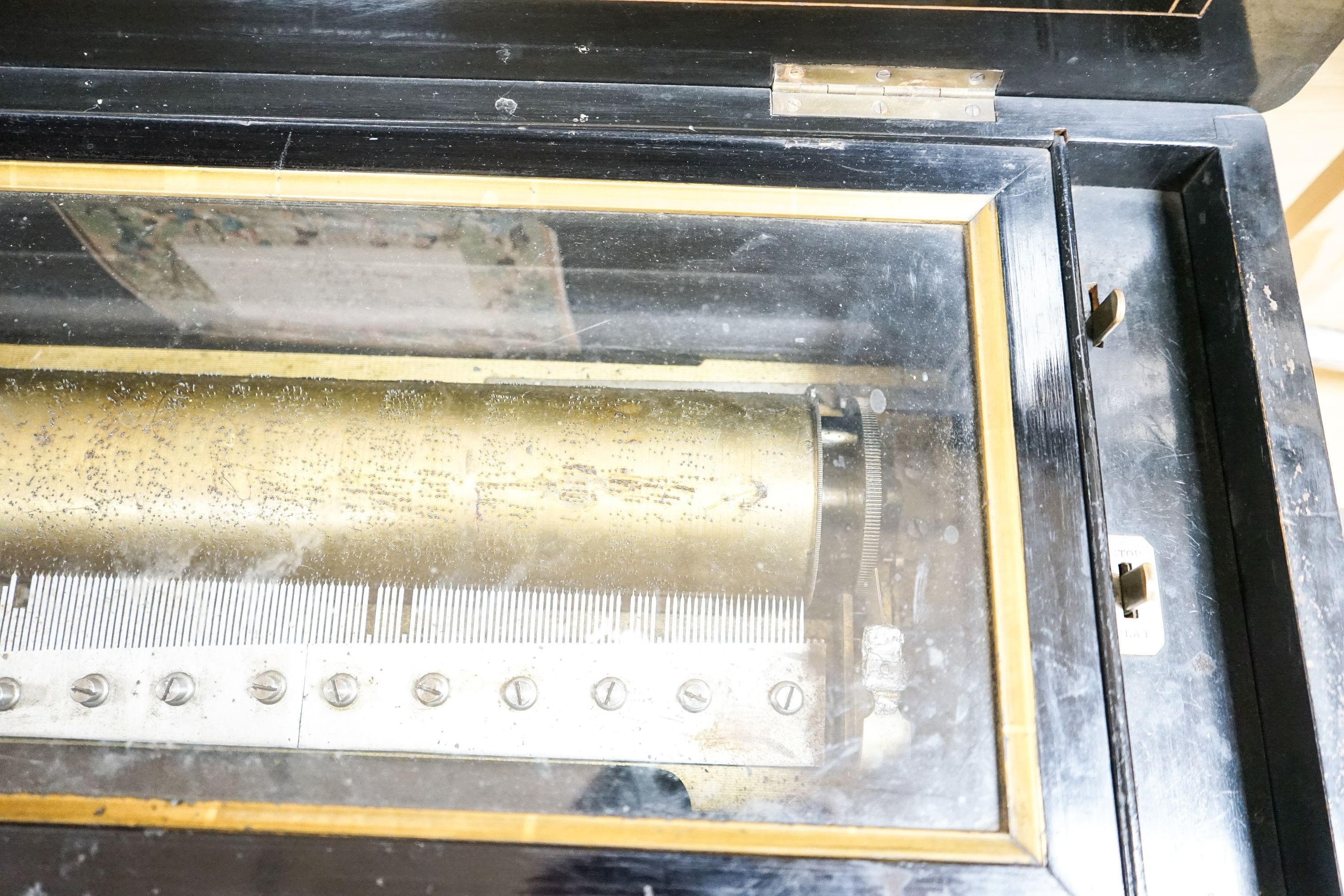 A 19th century Swiss cylinder musical box, (af) cylinder 38cm